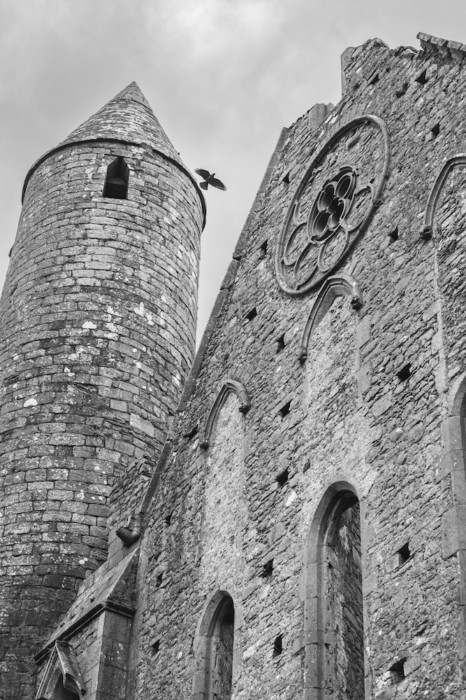 Exterior photograph of the rose window and spire at the Rock of Cashel in Ireland